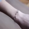 Pulsera micropave dijes
