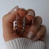 Aros con figuras mano
