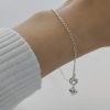 Pulsera con dije de corazón y cubic mano