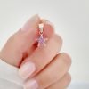 dije cristal estrella rosa