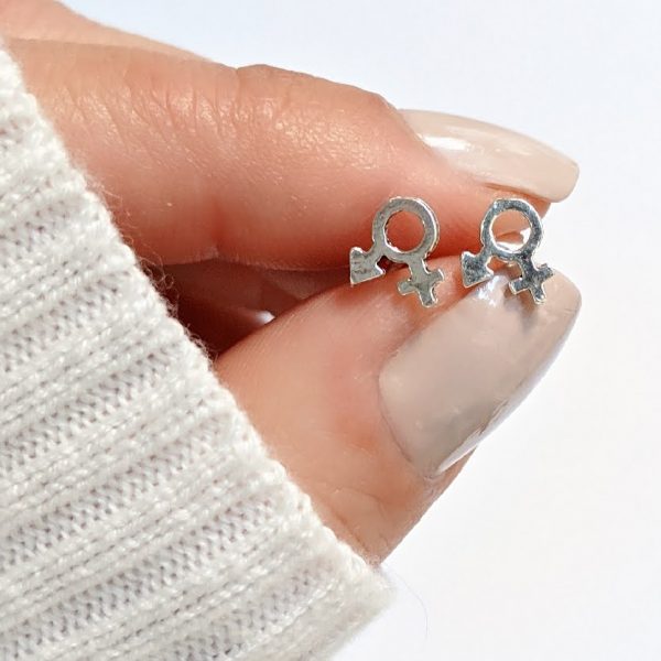 Aros símbolo femenino y masculino mano