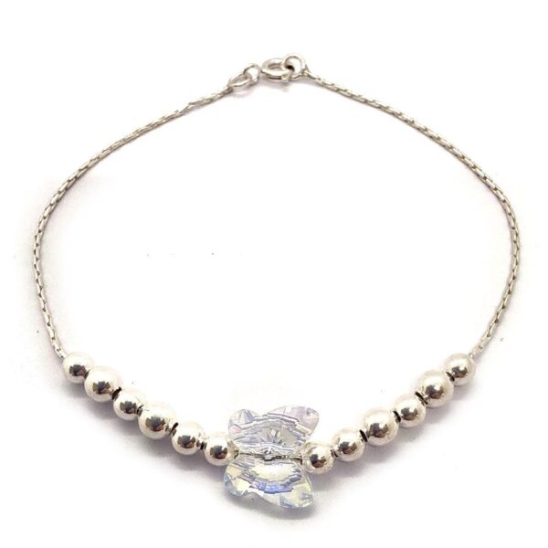 pulsera con bolitas y mariposa swarovski