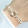 Pulsera Rolo con tres argollas cierre marinero