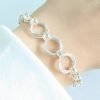 Pulsera Rolo con tres argollas cierre marinero