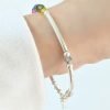 Pulsera tubos, piedras y bolitas