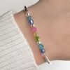 Pulsera tubos bolitas y piedras multicolor