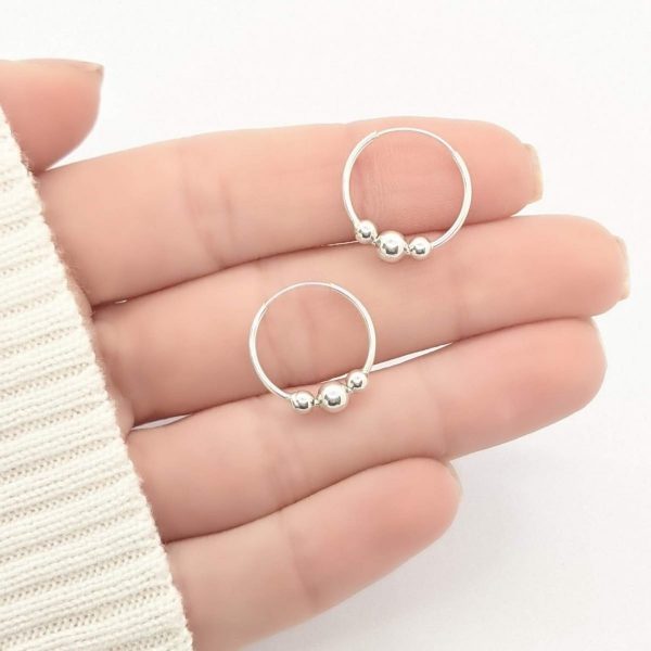 Aros argolla con tres bolitas