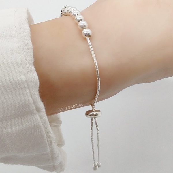 Pulsera ajustable bolitas lisas y bolitas flor
