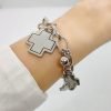 Pulsera cruz del equilibrio y bolitas acero