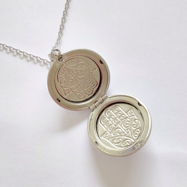 COAA-15 relicario acero quirurgico hamsa mano 1