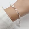 Pulsera rolo cristales y bolitas plata