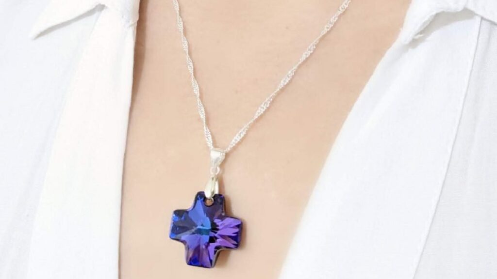 Collar cruz del equilibrio heliotrope