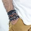 pulsera cuero sintético pluma