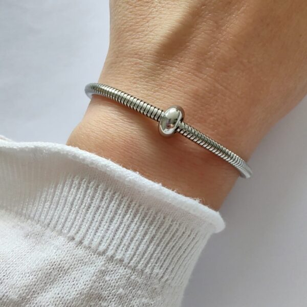 Dije Charm Dona Stopper Acero Quirúrgico Plateado