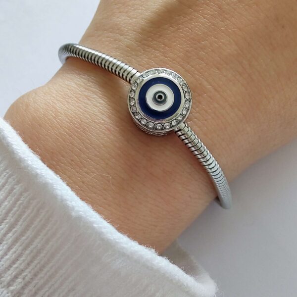 Dije Charm Ojo Turco Pasante Acero Quirúrgico Plateado